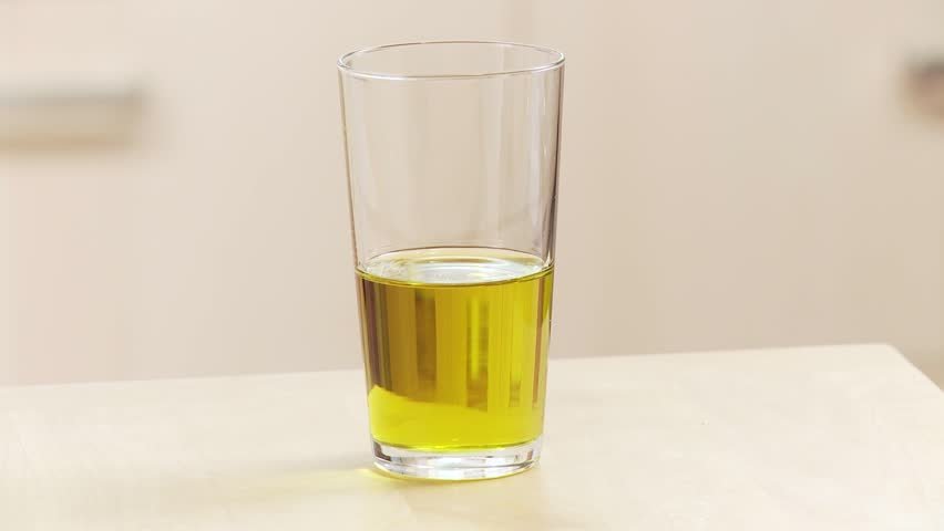 Olive oil in a drinking glass